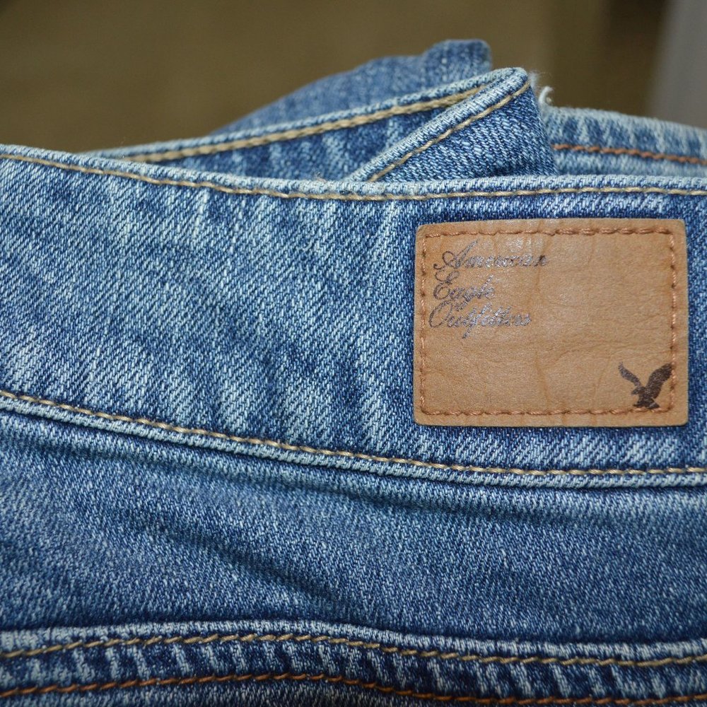 American Eagle Kick Bootcut, Stretch Size 4 Reg Med rise, Slightly Flared Faded